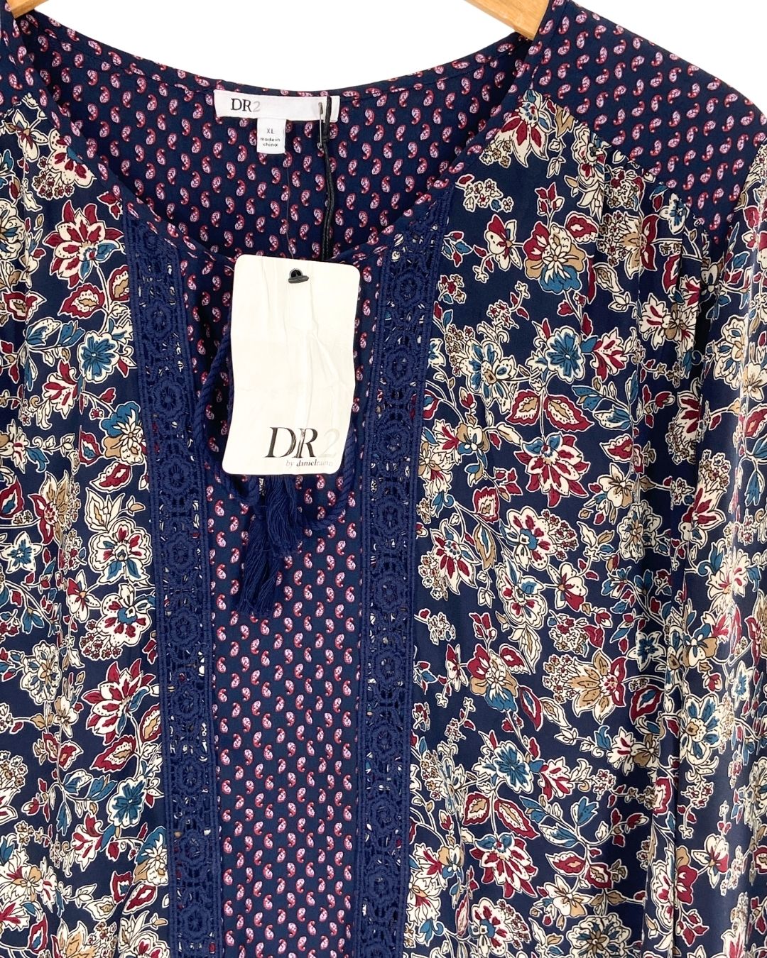 Blusa manga larga anudada