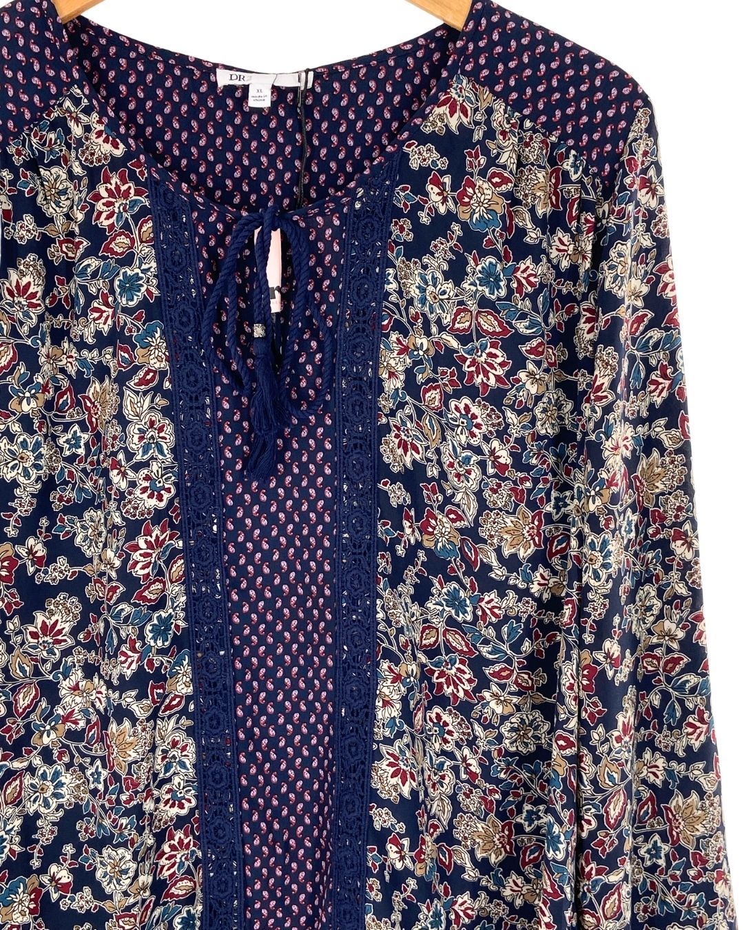 Blusa manga larga anudada
