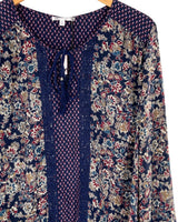 Blusa manga larga anudada