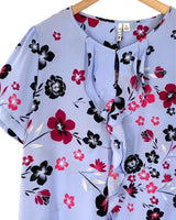 Blusa con vuelo en delantero
