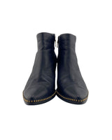 Botines en cuero con taches