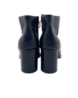 Botines en cuero con taches