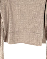 Blusa con textura escote