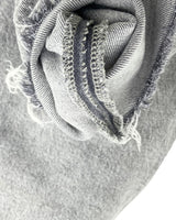 Mom jean en denim rigido botas