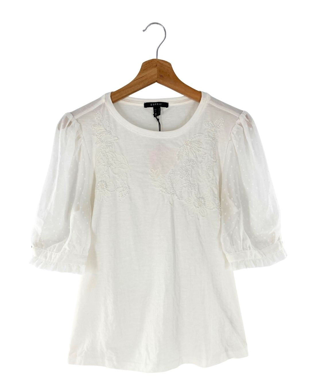 Blusa de mangas traslucidas