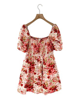 Vestido midi encauchado print