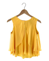 Blusa sleeveless con vuelo