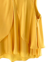 Blusa sleeveless con vuelo