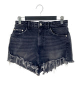Short mini en denim deshilado