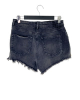 Short mini en denim deshilado
