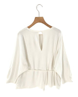 Blusa mariposa con cinturón