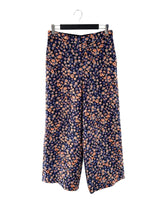 Pantalón palazzo con textura