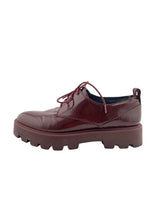 Loafers en charol con cordones