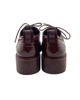 Loafers en charol con cordones