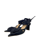 Sandalias romanas con roseta