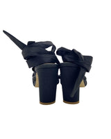 Sandalias romanas con roseta