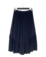 Falda abotonada con vuelo