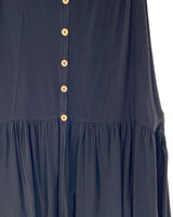 Falda abotonada con vuelo