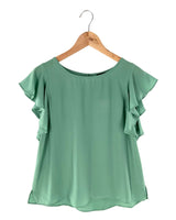 Blusa tralúcida con vuelos