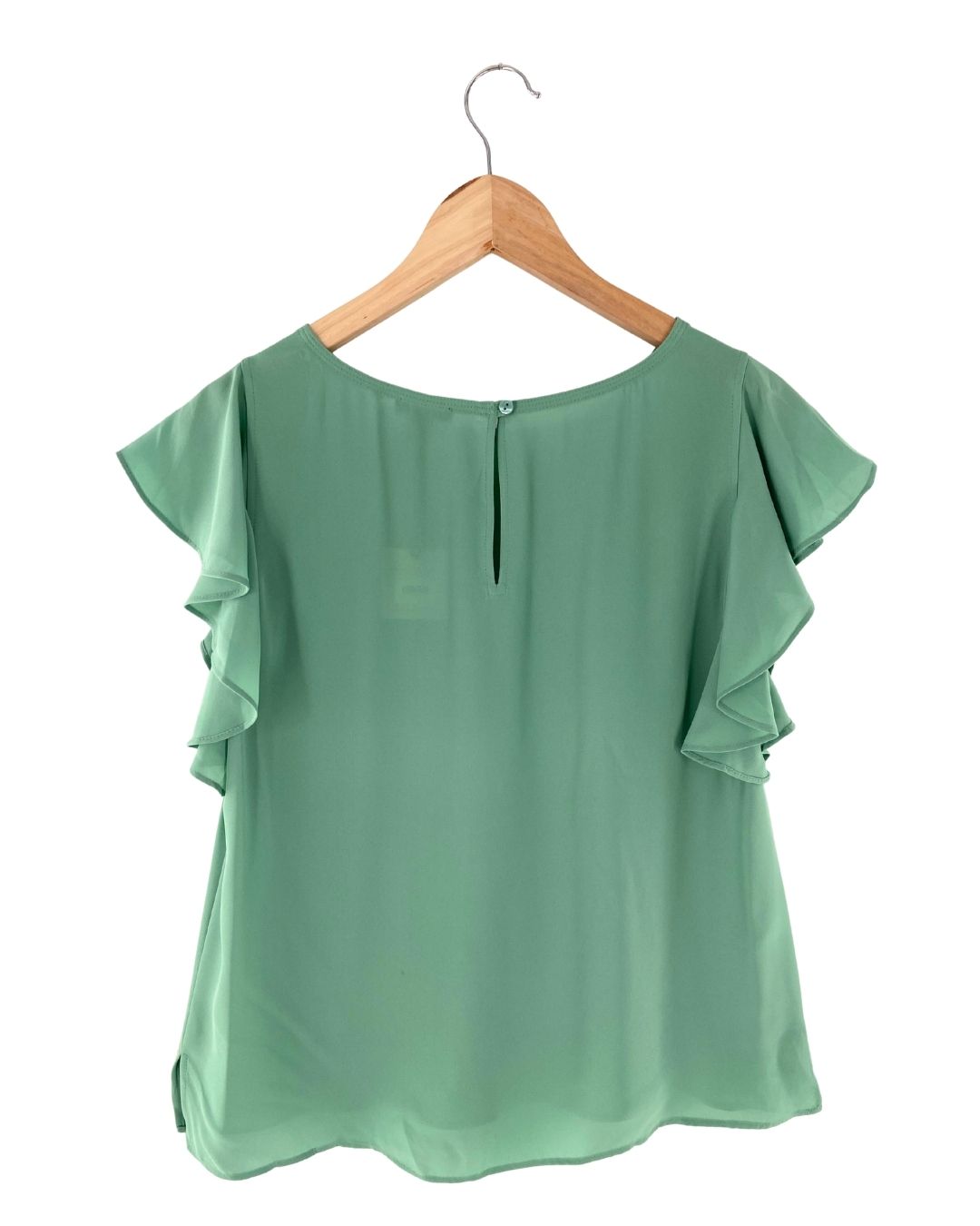 Blusa tralúcida con vuelos