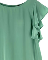 Blusa tralúcida con vuelos