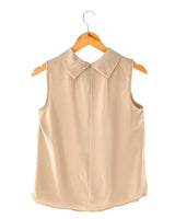 Blusa sleeveless cuello alto