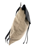 Bolso morral doble textura