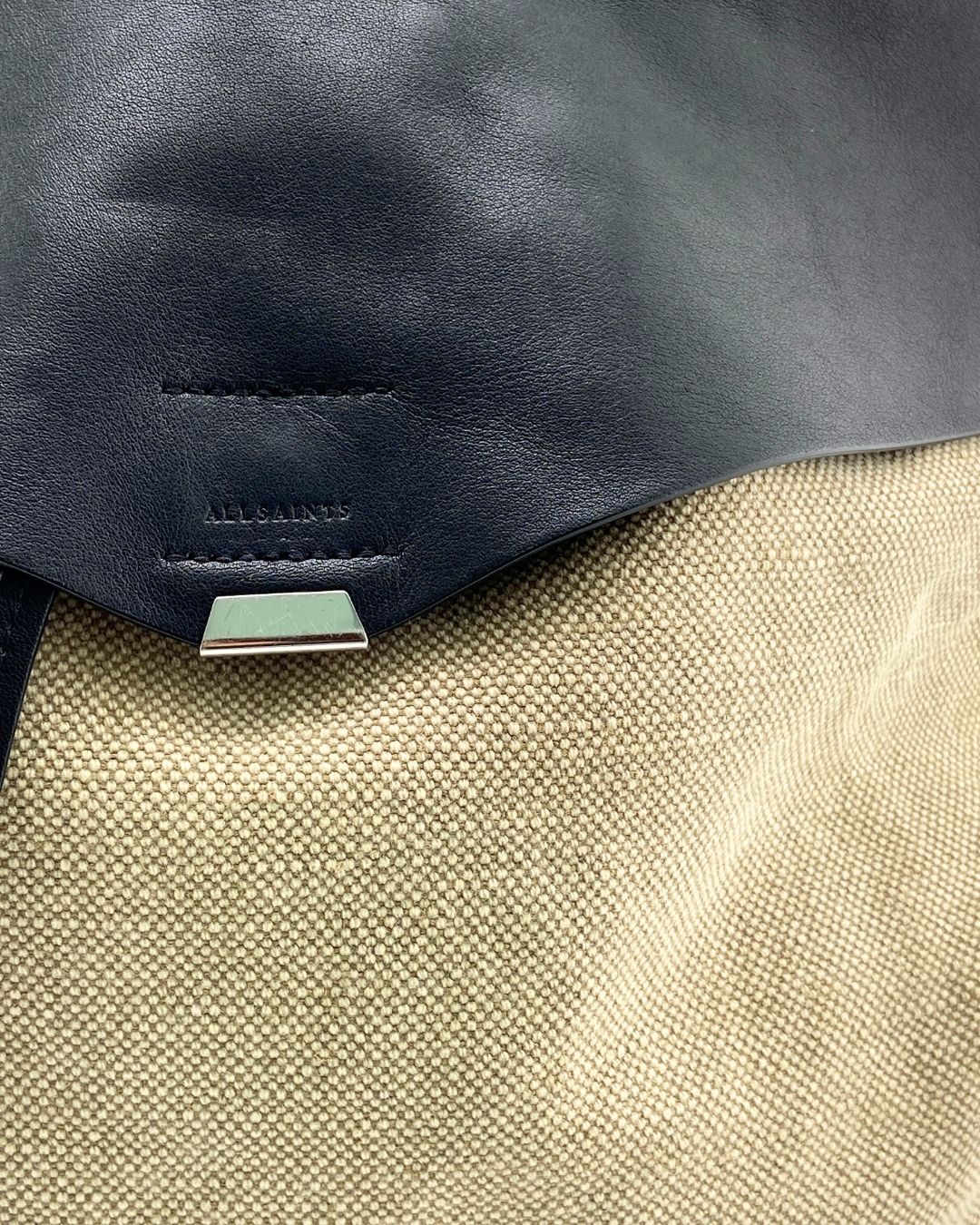 Bolso morral doble textura