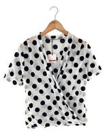 Blusa cruzada en mesh print