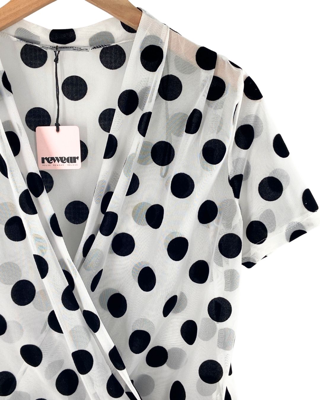 Blusa cruzada en mesh print
