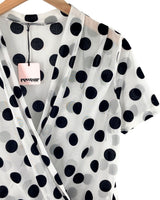 Blusa cruzada en mesh print