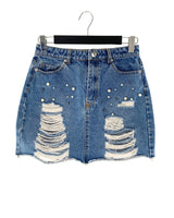 Falda mini en denim