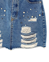 Falda mini en denim