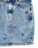 Falda mini en denim rigido