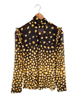 Blusa en mesh cuello alto