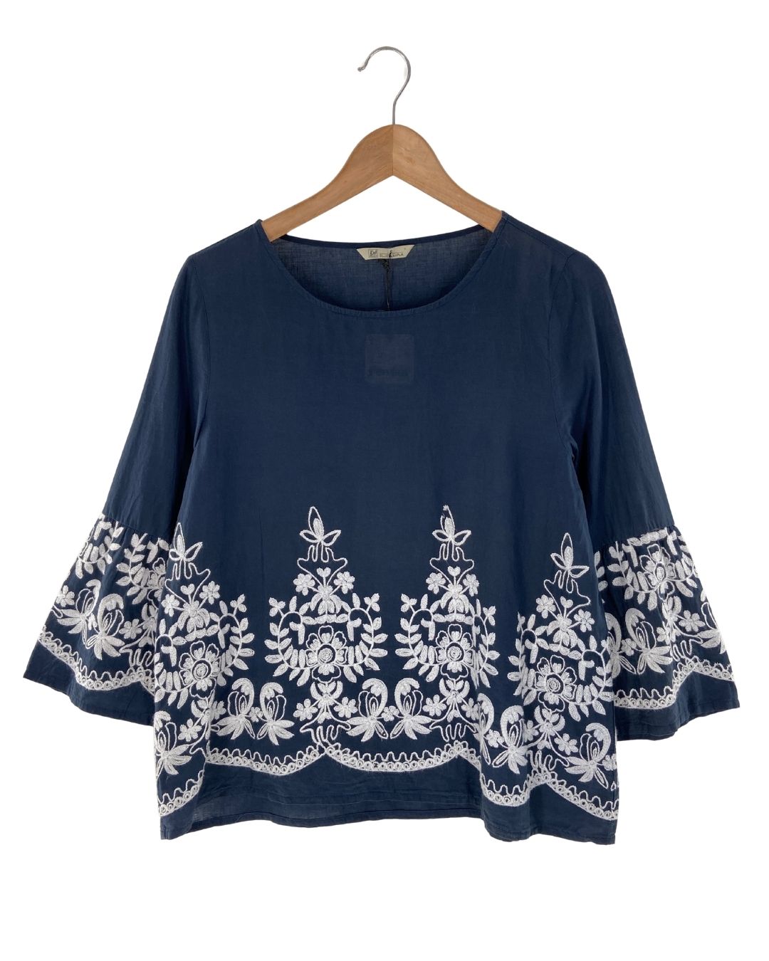 Blusa de puños amplios