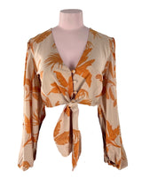 Blusa crop anudada puños