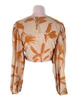 Blusa crop anudada puños