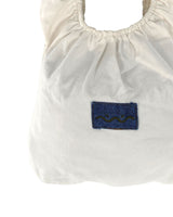 Bolso encauchado en denim