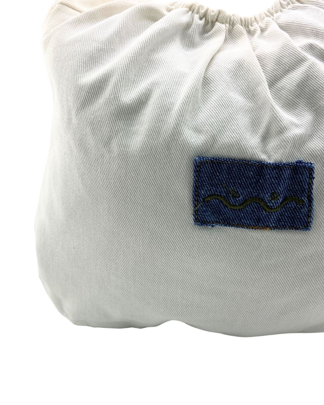 Bolso encauchado en denim