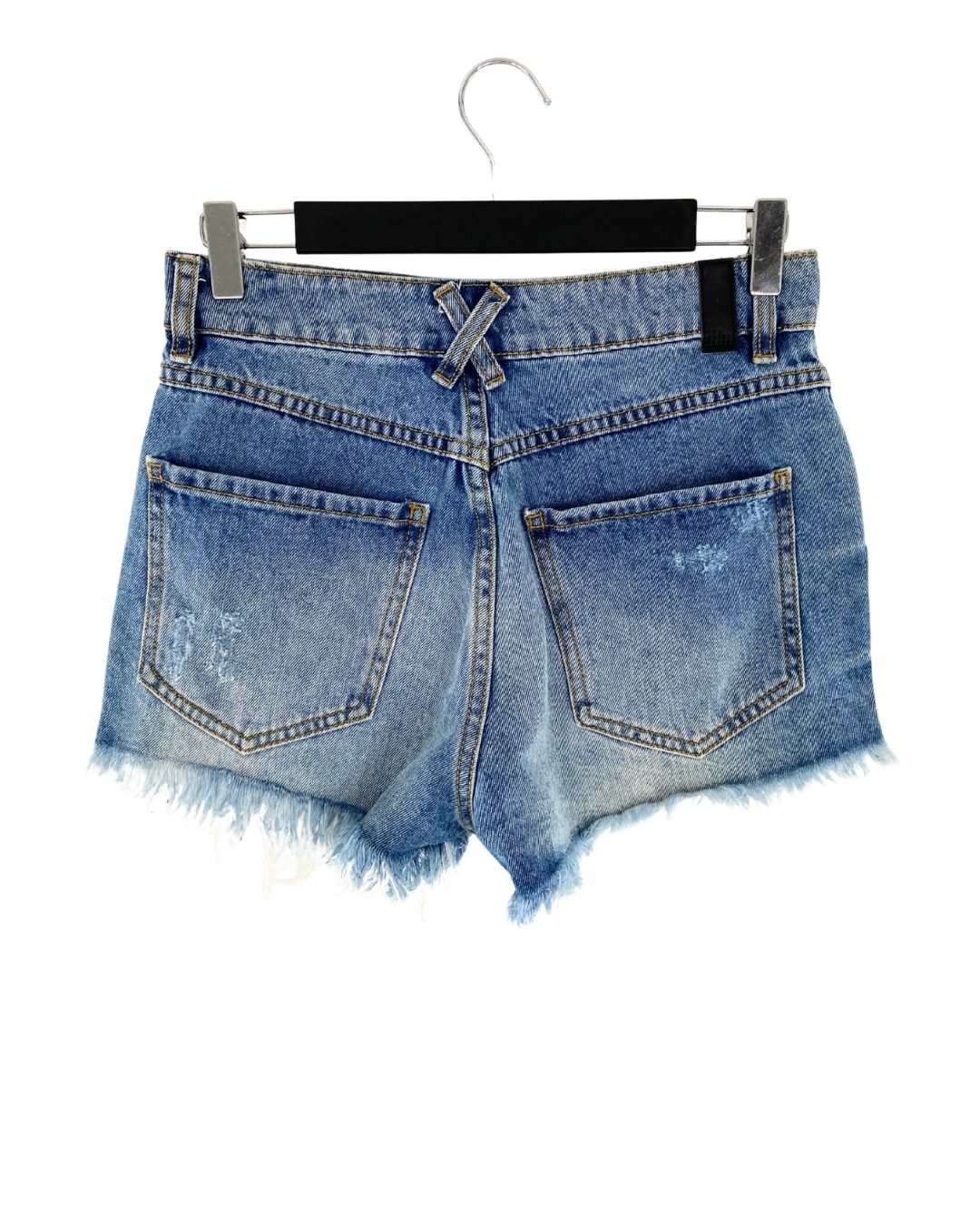Short en denim destroyed