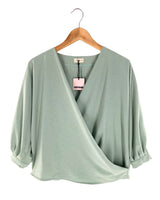 Blusa cruzada oversize