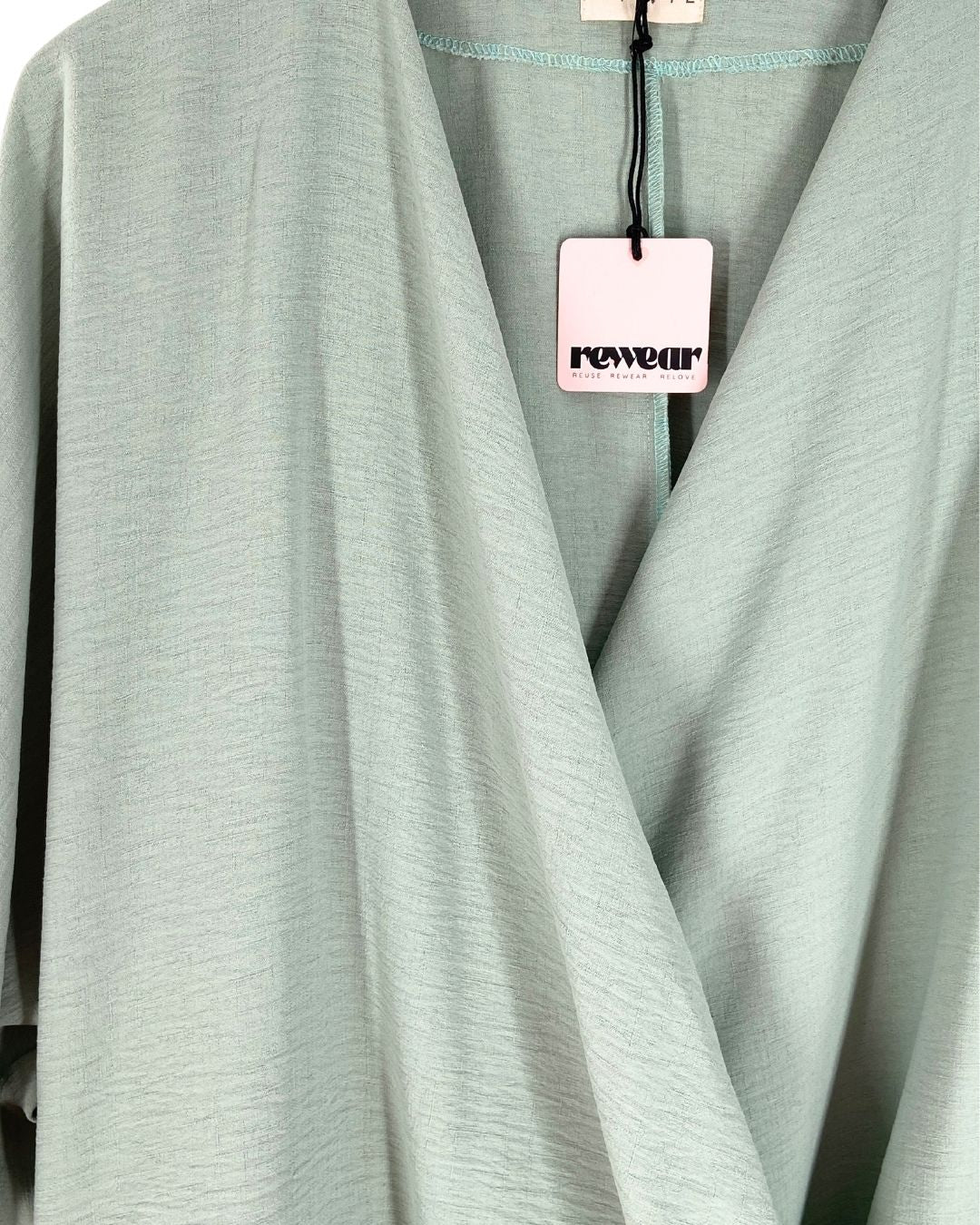 Blusa cruzada oversize