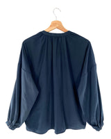 Blusa manga larga con textura