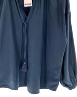 Blusa manga larga con textura