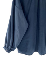 Blusa manga larga con textura