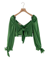 Blusa manga larga anudada