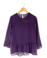 Blusa traslucida manga larga