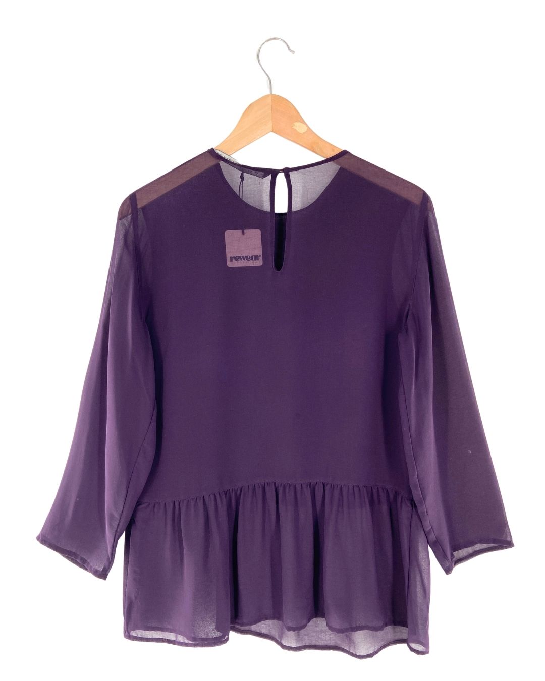 Blusa traslucida manga larga