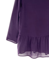 Blusa traslucida manga larga